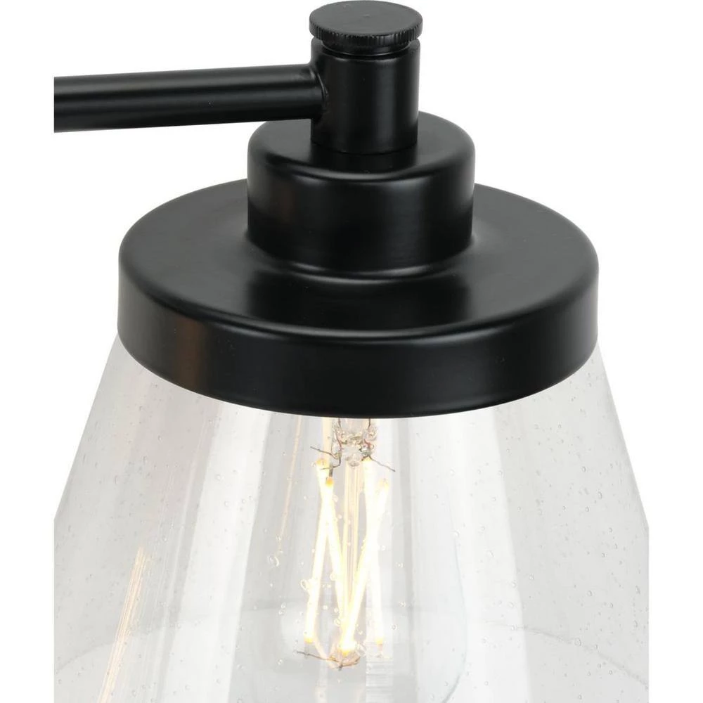 Hinton 33.5 in. 4-Light Matte Black Clear Seeded Glass Farmhouse Bath Vanity Light by Progress Lighting 5 Hinton 33.5 in. 4-Light Matte Black Clear Seeded Glass Farmhouse Bath Vanity Light by Progress Lighting - Image 3