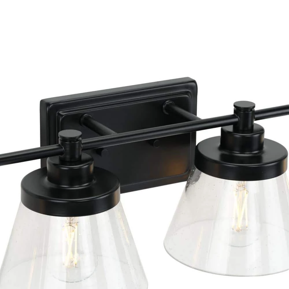 Hinton 33.5 in. 4-Light Matte Black Clear Seeded Glass Farmhouse Bath Vanity Light by Progress Lighting 6 Hinton 33.5 in. 4-Light Matte Black Clear Seeded Glass Farmhouse Bath Vanity Light by Progress Lighting - Image 4