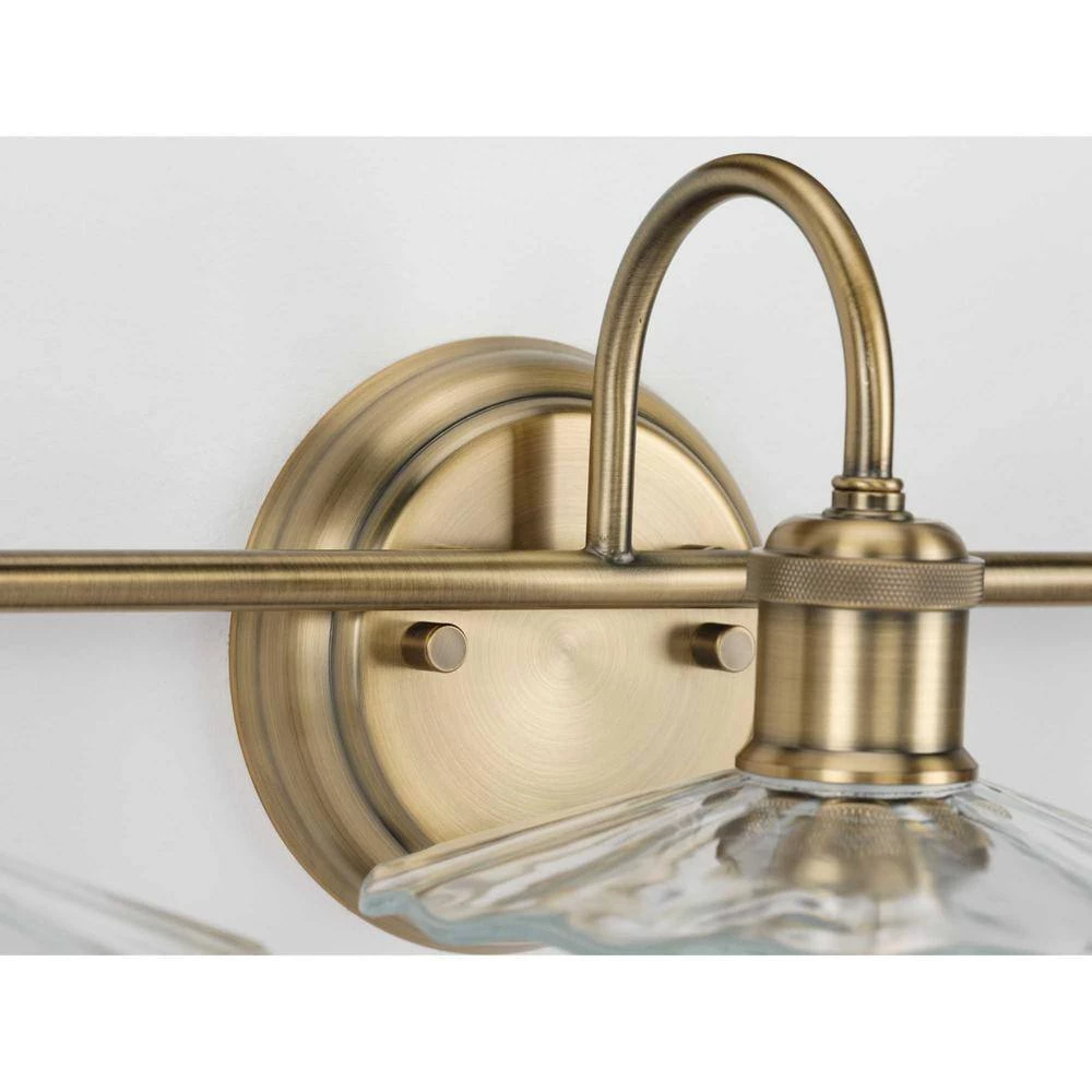 Fayette Collection 3-Light Vintage Brass Clear Glass Farmhouse Bath Vanity Light by Progress Lighting 5 Fayette Collection 3-Light Vintage Brass Clear Glass Farmhouse Bath Vanity Light by Progress Lighting - Image 3